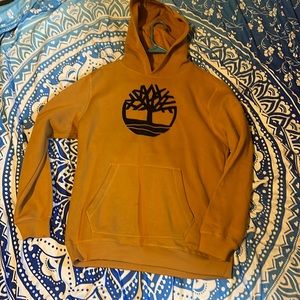 Timberland size xl fits a woman’s medium as I wore it once.